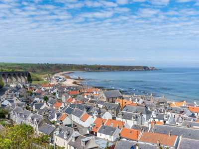 Cullen Village with houses along the coast and beach