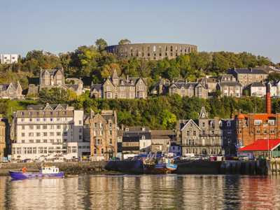 Waterfront view of MacCaigs tower in Oban